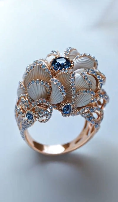 Exquisite Rose Gold Ring with Blue Sapphire and Shell - Inspired Design