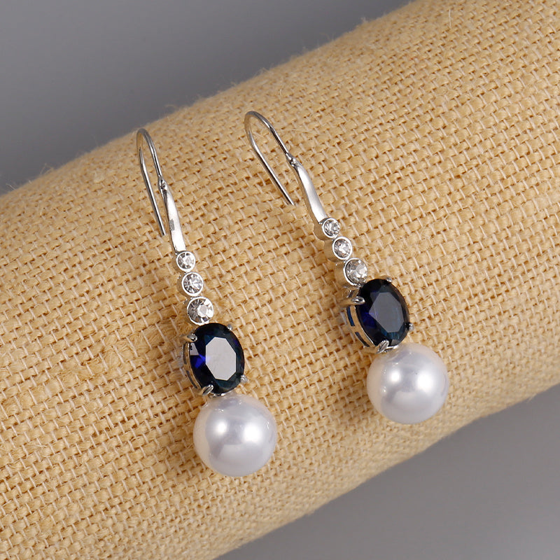 
Cerdynau Zirconia Lliwgar Pearl a Gwynlas Hanesyddol
