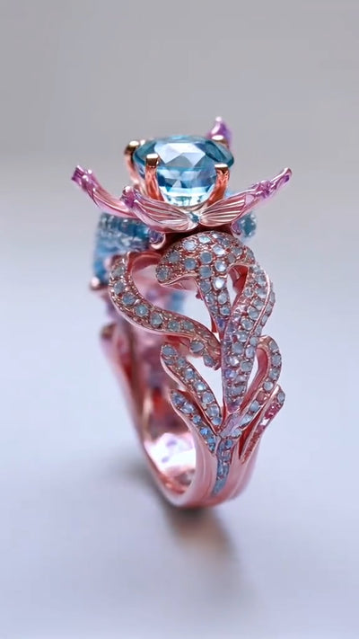 Exquisite Rose Gold Ring with Aquamarine and Pink Gemstone Embellishments