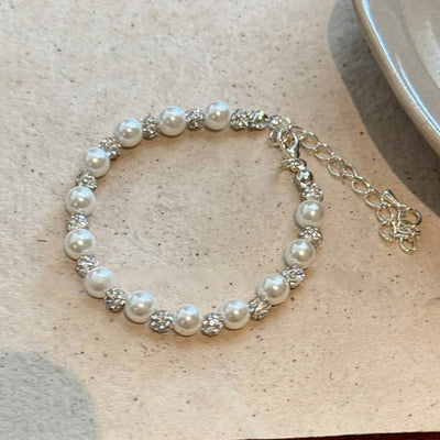 Diamond Studded Round Pearl Bracelet