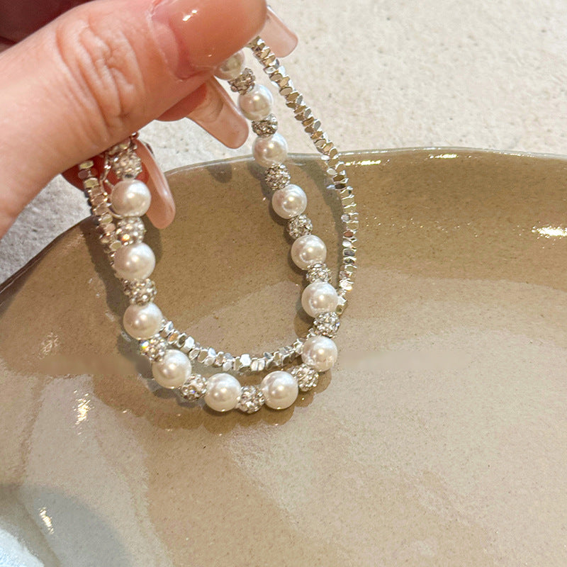 Diamond Studded Round Pearl Bracelet